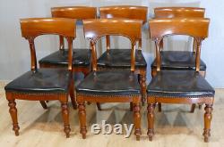 6 Charles X mahogany and leather bandeau chairs, early 19th century period