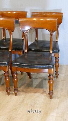 6 Charles X mahogany and leather bandeau chairs, early 19th century period