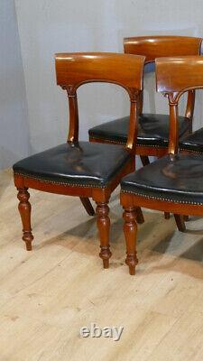 6 Charles X mahogany and leather bandeau chairs, early 19th century period