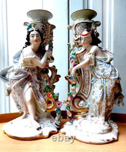 ANCIENT PAIR OF PORCELAIN AND BISCUIT CANDLESTICKS 19TH CENTURY