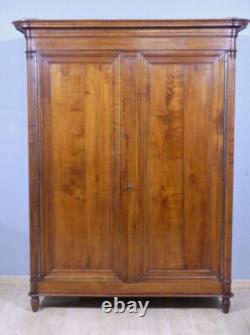 About Louis XVI Armoire with Fluting in Solid Cherry, Late 19th Century