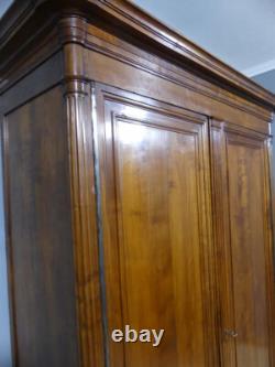 About Louis XVI Armoire with Fluting in Solid Cherry, Late 19th Century