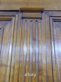 About Louis XVI Armoire with Fluting in Solid Cherry, Late 19th Century