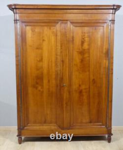About Louis XVI Armoire with Fluting in Solid Cherry, Late 19th Century