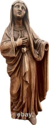 Ancient carved wooden Virgin, 16th-century folk art work