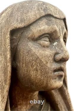 Ancient carved wooden Virgin, 16th-century folk art work