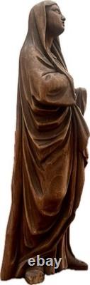 Ancient carved wooden Virgin, 16th-century folk art work