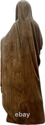 Ancient carved wooden Virgin, 16th-century folk art work