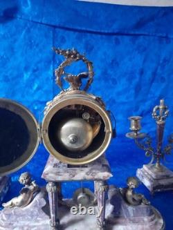 Antique bronze clock with cherub decorations, late 19th to early 20th century, Louis XVI style