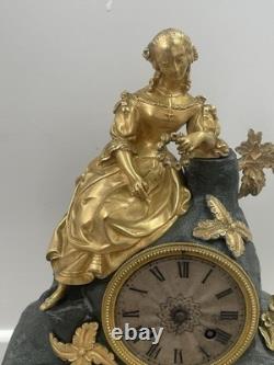 Antique gilt bronze clock, 19th century, key-wound movement