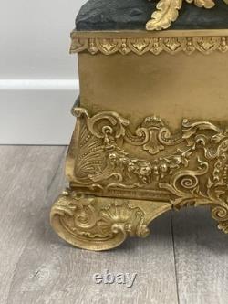 Antique gilt bronze clock, 19th century, key-wound movement