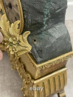 Antique gilt bronze clock, 19th century, key-wound movement