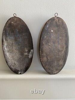 Antique pair of wall medallions in cast iron from the 19th century, 1.8kg