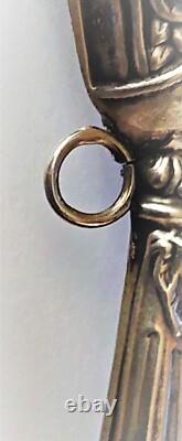 Antique silver rattle with rose decoration, late 19th century