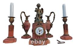 Bronze mantel clock with cherub, cassolette candle holders, Louis XVI style, 19th century period