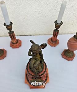 Bronze mantel clock with cherub, cassolette candleholders, Louis XVI style, 19th century period