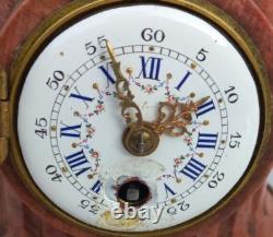Bronze mantel clock with cherub, cassolette candleholders, Louis XVI style, 19th century period