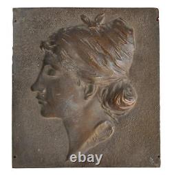 Bronze plaque of a female character from the 19th century