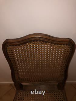 Cane chair from the Louis XV period. Carved solid beechwood, 18th century