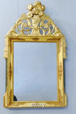 Carved and Gilded Wooden Empire Mirror with Pediment from the Early 19th Century