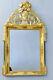 Carved And Gilded Wooden Empire Mirror With Pediment From The Early 19th Century