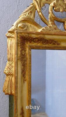 Carved and Gilded Wooden Empire Mirror with Pediment from the Early 19th Century