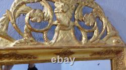 Carved and Gilded Wooden Empire Mirror with Pediment from the Early 19th Century