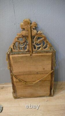 Carved and Gilded Wooden Empire Mirror with Pediment from the Early 19th Century