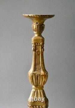 Carved and gilded wooden candlestick, 19th century