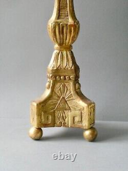 Carved and gilded wooden candlestick, 19th century