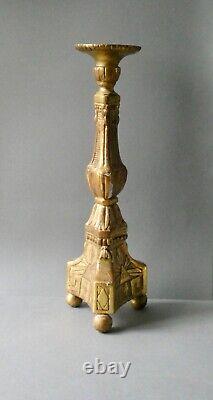 Carved and gilded wooden candlestick, 19th century