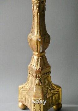 Carved and gilded wooden candlestick, 19th century