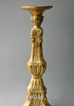 Carved and gilded wooden candlestick, 19th century