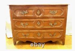 Carved and molded oak Parisian chest of drawers from the 18th century