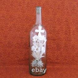 Ceremonial Bouquet In A Large 19th Century Blown Glass Bottle