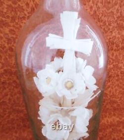 Ceremonial Bouquet In A Large 19th Century Blown Glass Bottle