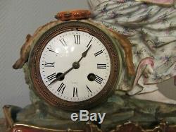 Clock-in-porcelain-enamelled-polychrome- Xixth Century Signed Whipped