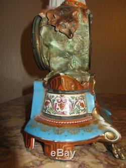 Clock-in-porcelain-enamelled-polychrome- Xixth Century Signed Whipped