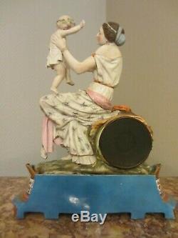 Clock-in-porcelain-enamelled-polychrome- Xixth Century Signed Whipped