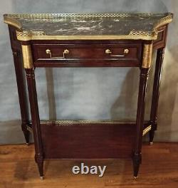 Console LXVI with marble top and brass gallery. Late 19th century period.