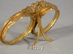 Double photo frame in gilded brass, late 19th century