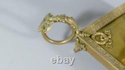 Empire Style Hand Candleholder from the Late 19th Century in Bronze and Brass
