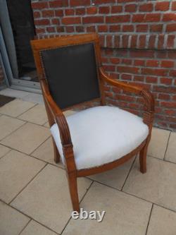 Empire-era office chair. Early 19th century. Desk. Living room.