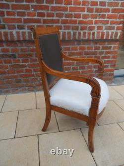 Empire-era office chair. Early 19th century. Desk. Living room.