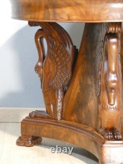 Empire-period swan pedestal table in flame mahogany and Turquin marble, 19th century