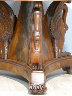 Empire-period swan pedestal table in flame mahogany and Turquin marble, 19th century