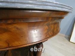 Empire-period swan pedestal table in flame mahogany and Turquin marble, 19th century