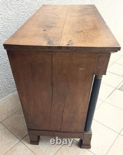 Empire-period walnut commode