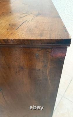 Empire-period walnut commode