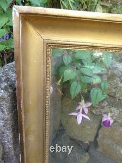 Frame from the Restoration period with original XIX century glass and original gilding.